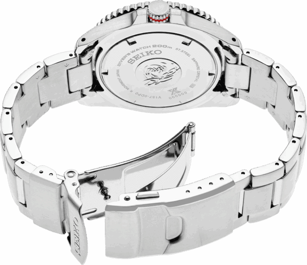 Close-up of a luxury wristwatch's metal clasp and back case.