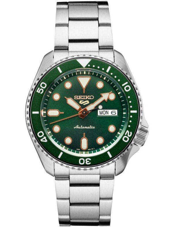 Seiko automatic dive watch with green dial and stainless steel bracelet.