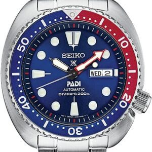 Seiko PADI diver's watch with blue and red bezel and day-date display.