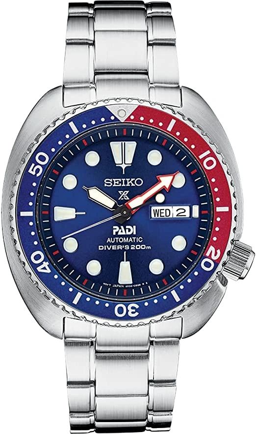 Seiko PADI diver's watch with blue and red bezel and day-date display.