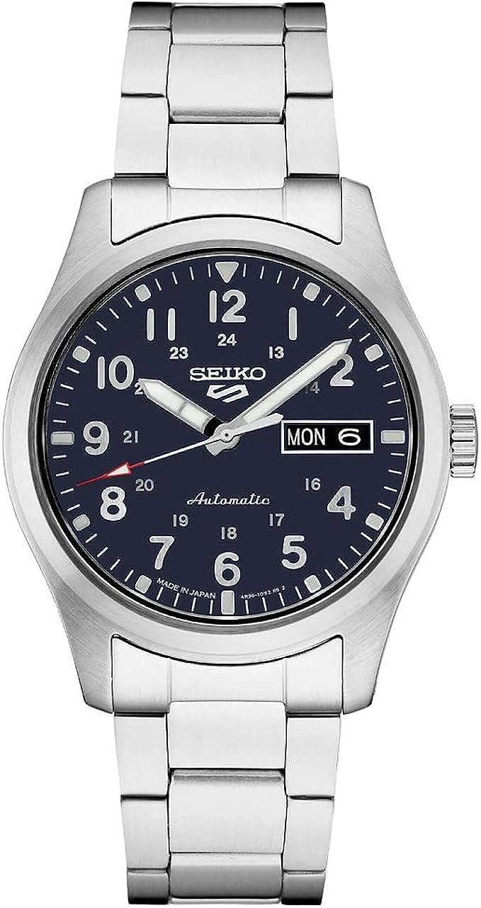 A Seiko 5 automatic wristwatch with a black dial and silver case.
