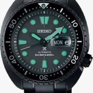 Black Seiko dive watch with luminous hands and markers.