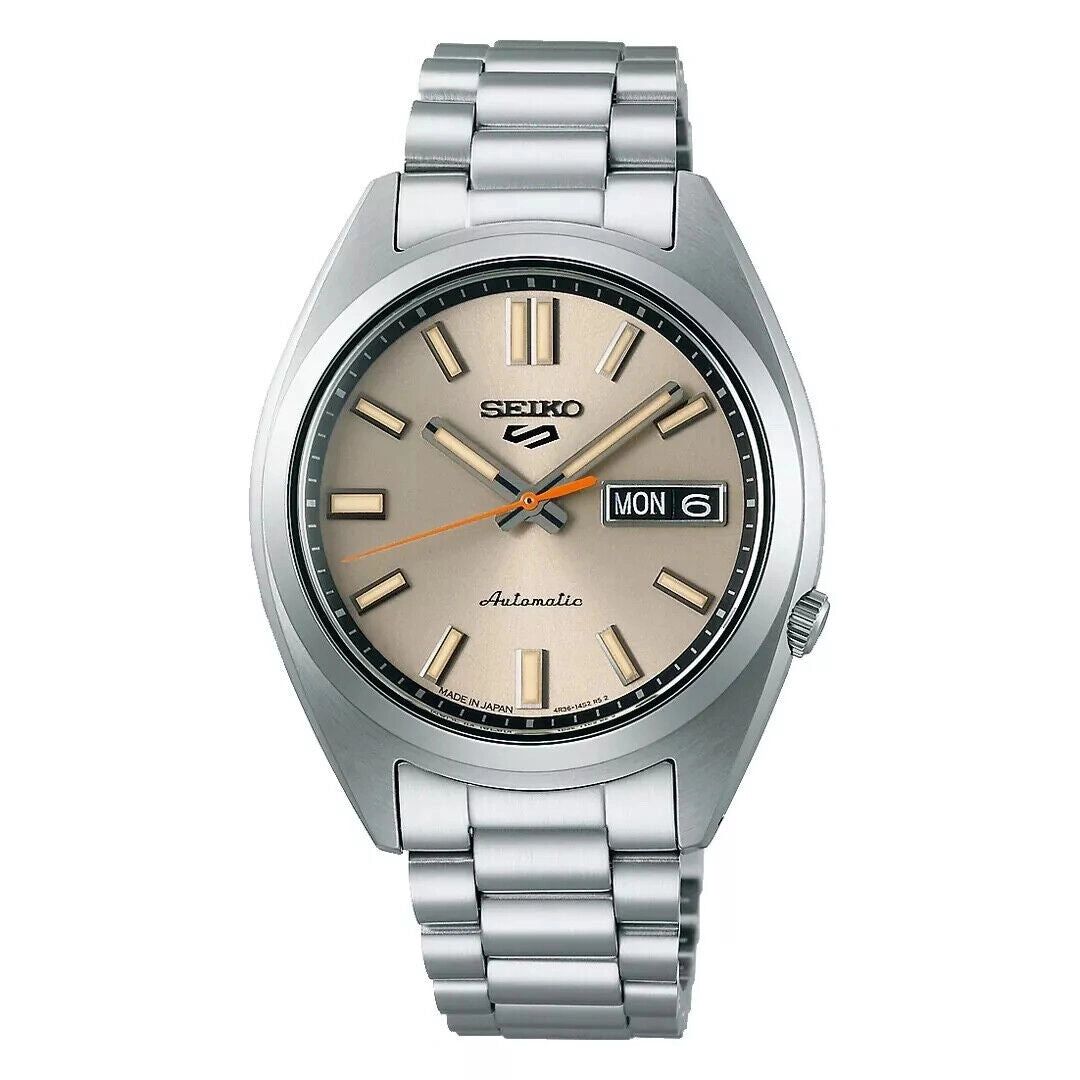 Classic silver wristwatch with a beige dial and metal band.