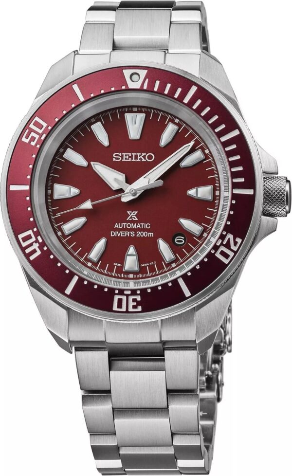 A Seiko Prospex dive watch with a red dial and stainless steel bracelet.