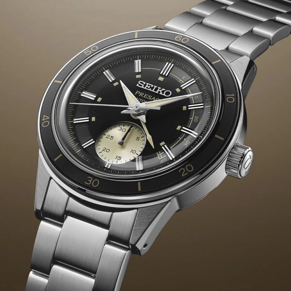 Elegant Seiko wristwatch with black dial and stainless steel bracelet.