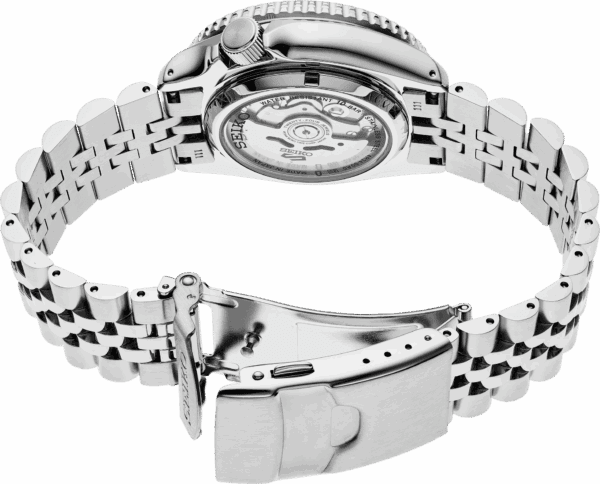 Close-up of a luxury watch's stainless steel bracelet and clasp mechanism.