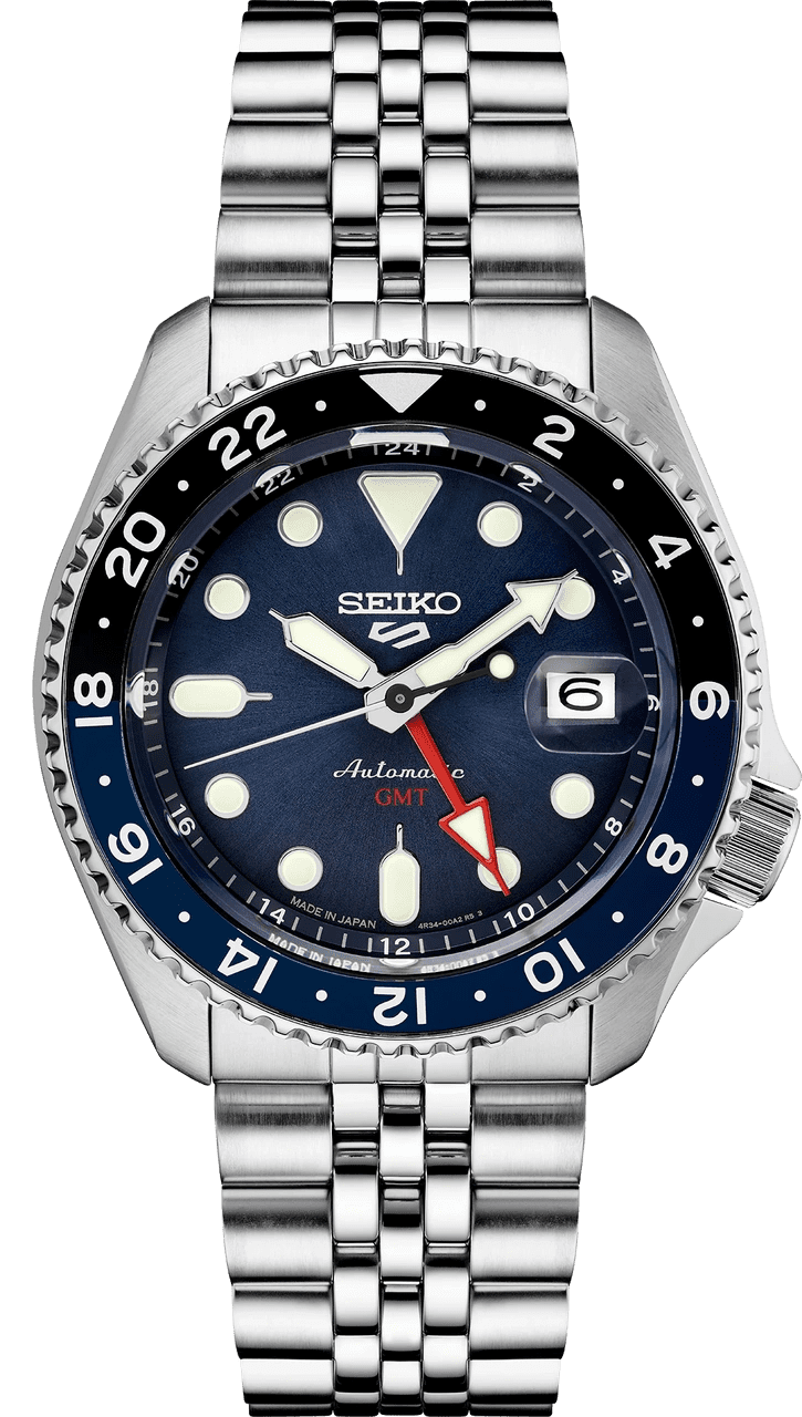 Seiko automatic dive watch with blue and black bezel and date display.