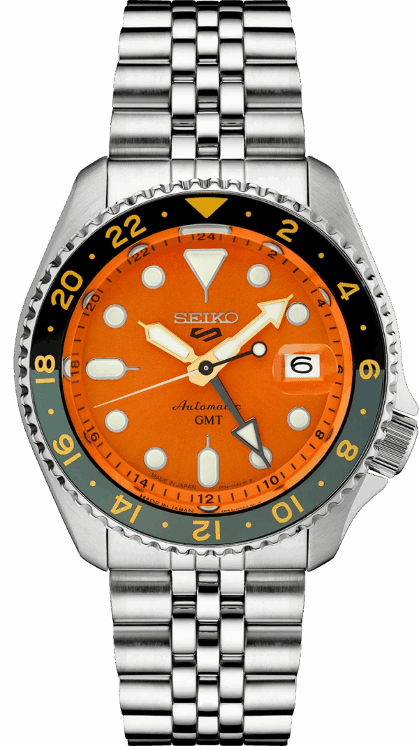 Seiko automatic GMT watch with bright orange dial and stainless steel bracelet.