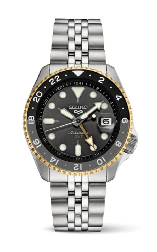 Seiko wristwatch with black and gold bezel and metal band.