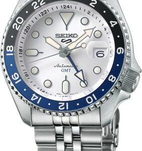 Seiko GMT watch with blue and black bezel and white dial.