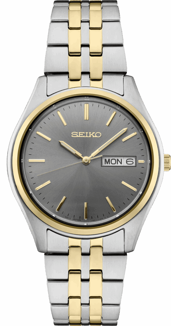 A stylish Seiko wristwatch with a gold and silver design.