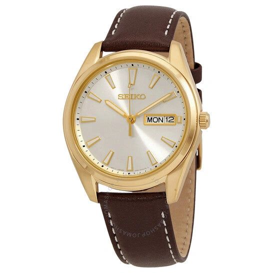 Elegant gold-tone wristwatch with brown leather strap and day-date display.