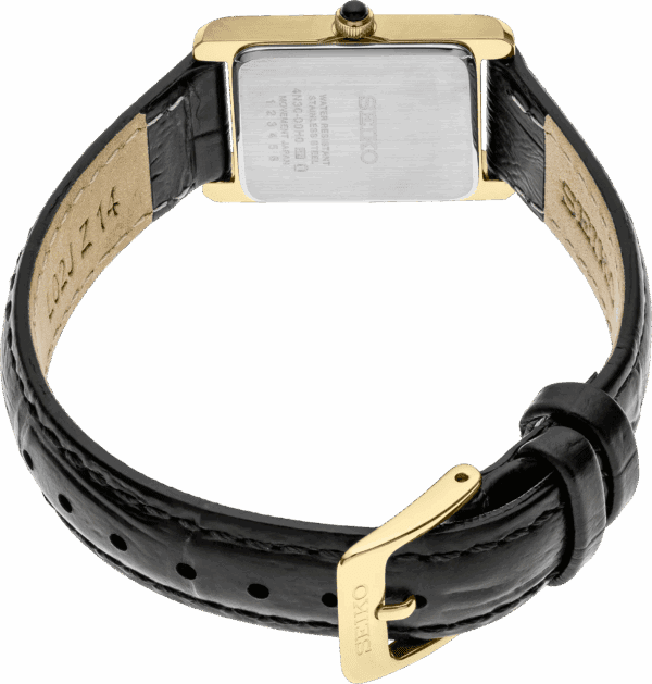 Black leather watch strap with gold buckle and rectangular watch face back.