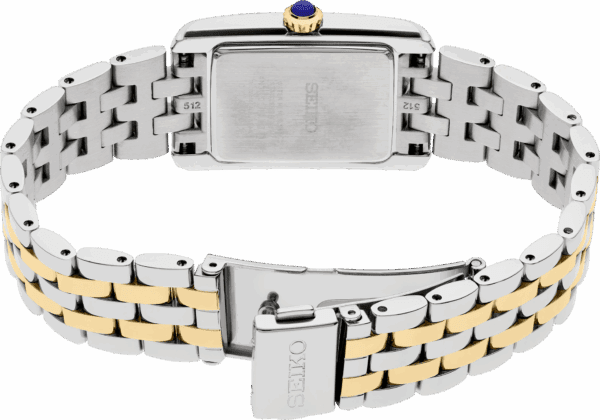 Close-up of a two-tone metal wristwatch with a rectangular face and linked bracelet.