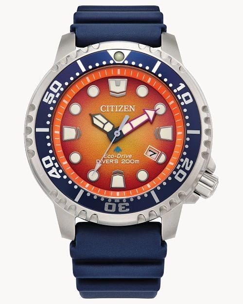 Close-up of a Citizen dive watch with orange dial and blue strap.