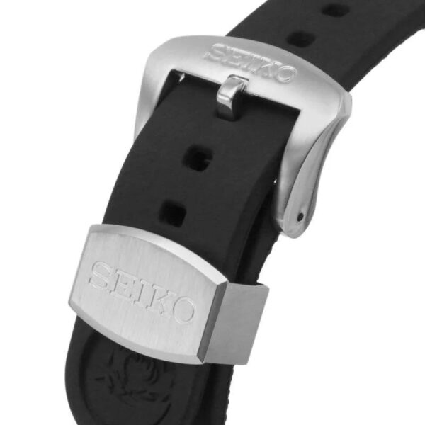 Close-up of a black watch strap with a silver buckle and clasp.