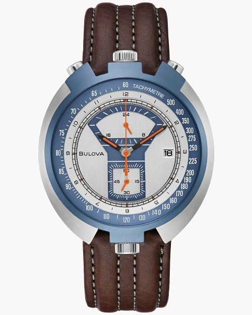 Close-up of a stylish wristwatch with a blue bezel and brown leather strap.