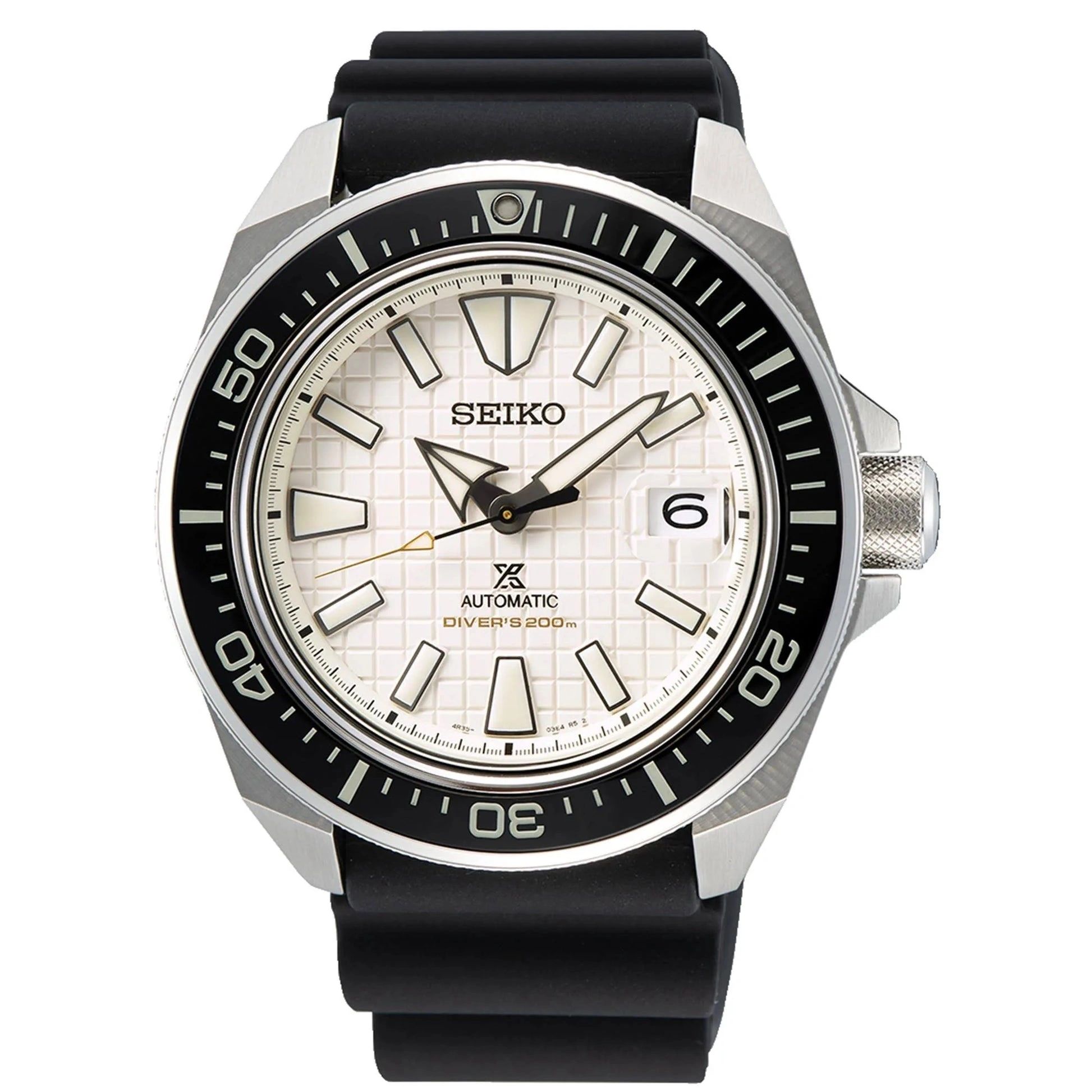 Seiko diving watch with black bezel and white dial on black strap.
