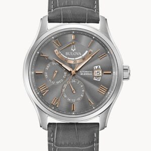Elegant silver wristwatch with a gray leather strap and date display.