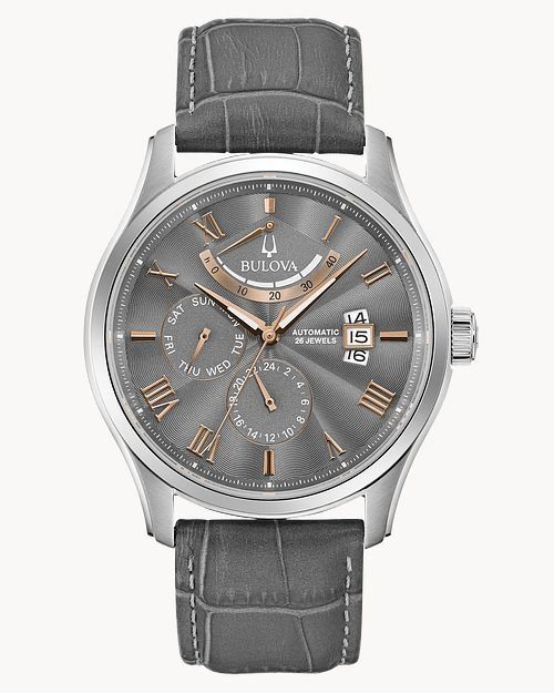 Elegant silver wristwatch with a gray leather strap and date display.