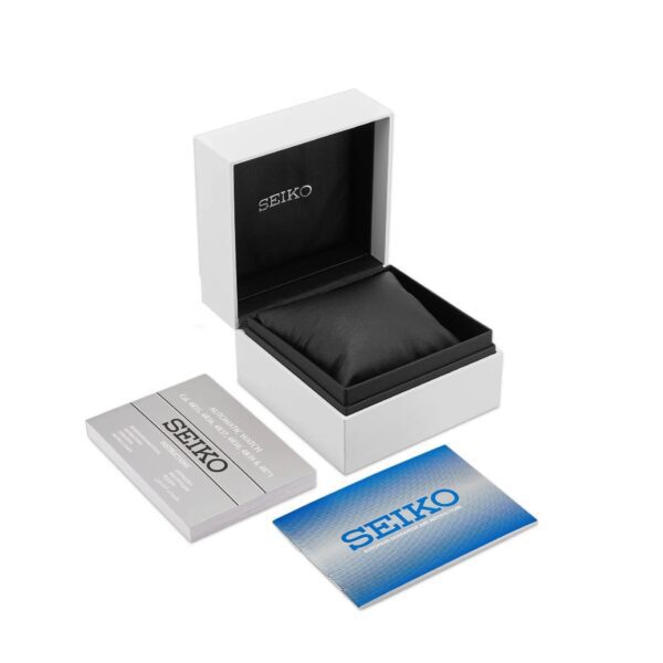 Open Seiko watch box with manuals and warranty card.
