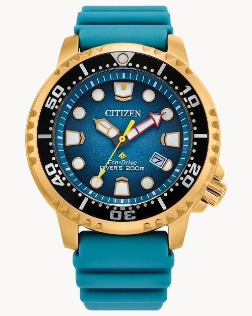 Gold-tone Citizen dive watch with blue dial and turquoise strap.