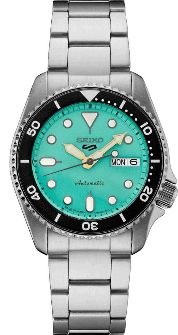 Seiko dive watch with turquoise dial and stainless steel bracelet.