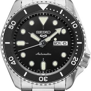 Seiko automatic dive watch with black dial and day-date display.