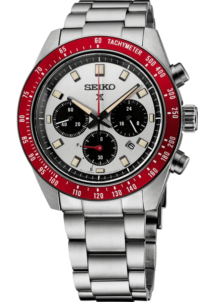 Seiko chronograph watch with red bezel and stainless steel bracelet.
